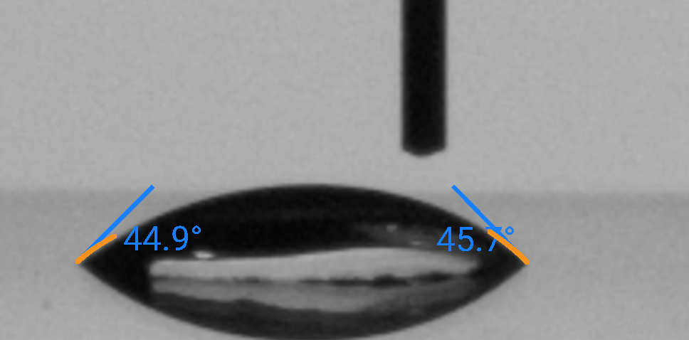 Sessile drop contact angle measurement: DI Water on Teflon surface, left contact angle 44.9°, right 45.7°